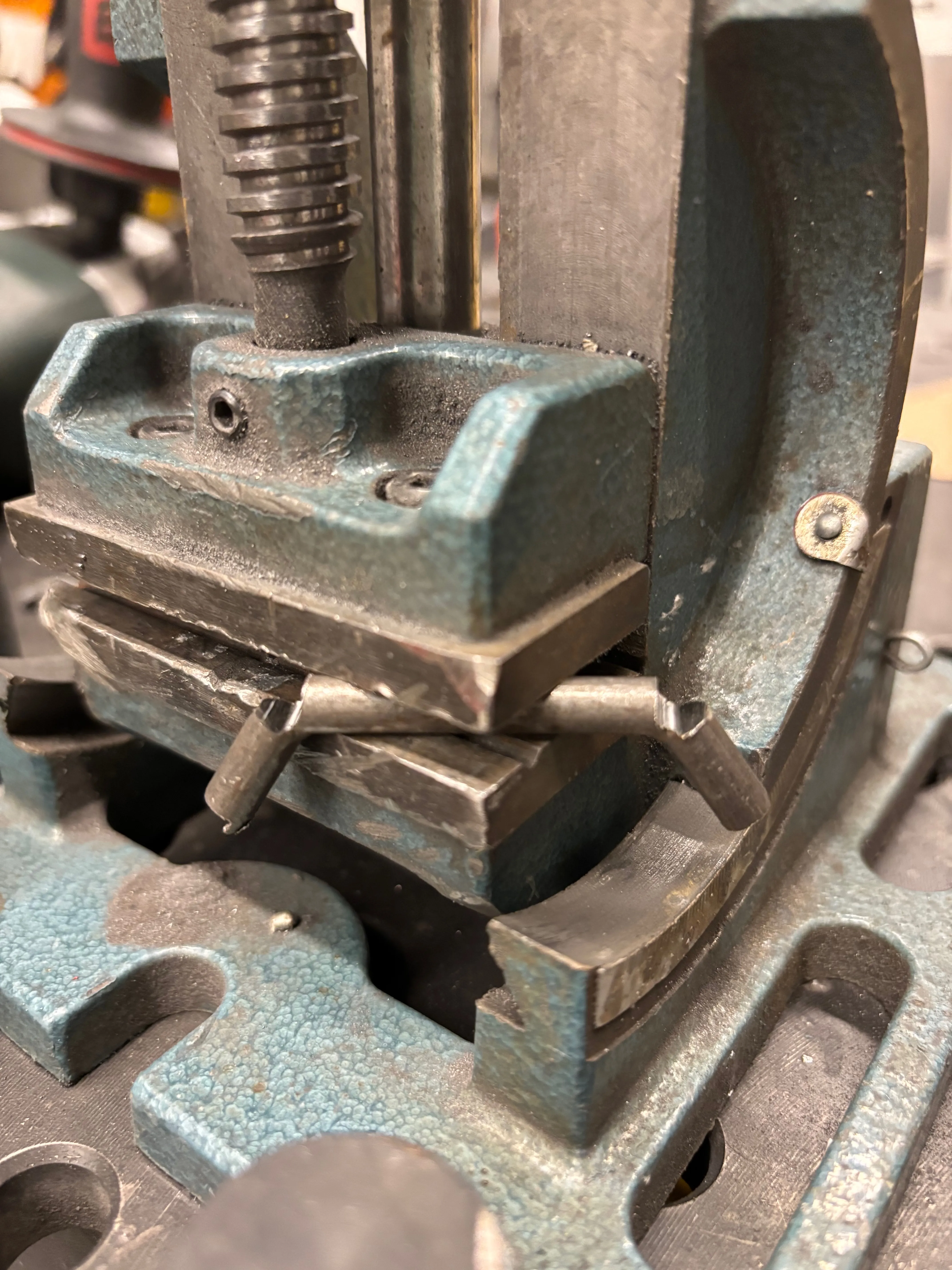 Cut and bent piece of steel for the handle bars